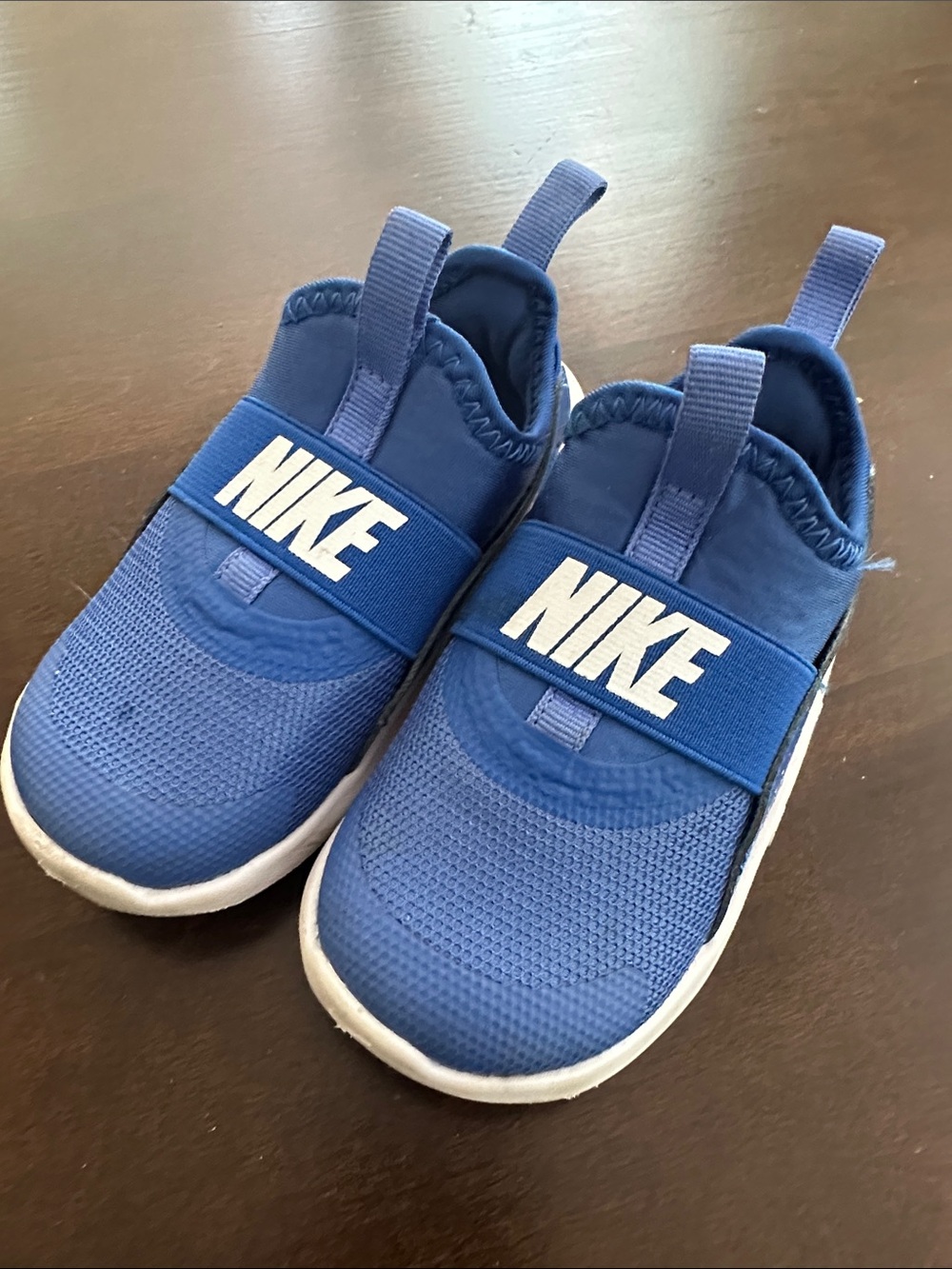 Nike Kids Blue Slip-On Sneakers with White Logo